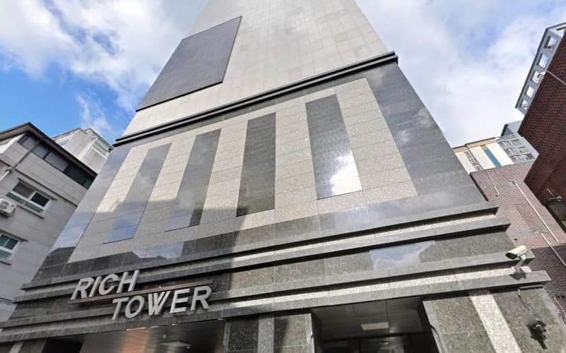 Rich Tower, an officetel beside Seoul National University Station, from the street.