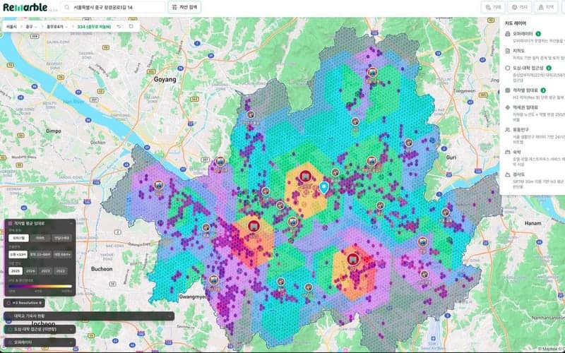 Remarble Earth's city view: Greater Seoul on a rent grid, with operator assets and the layer panel open.